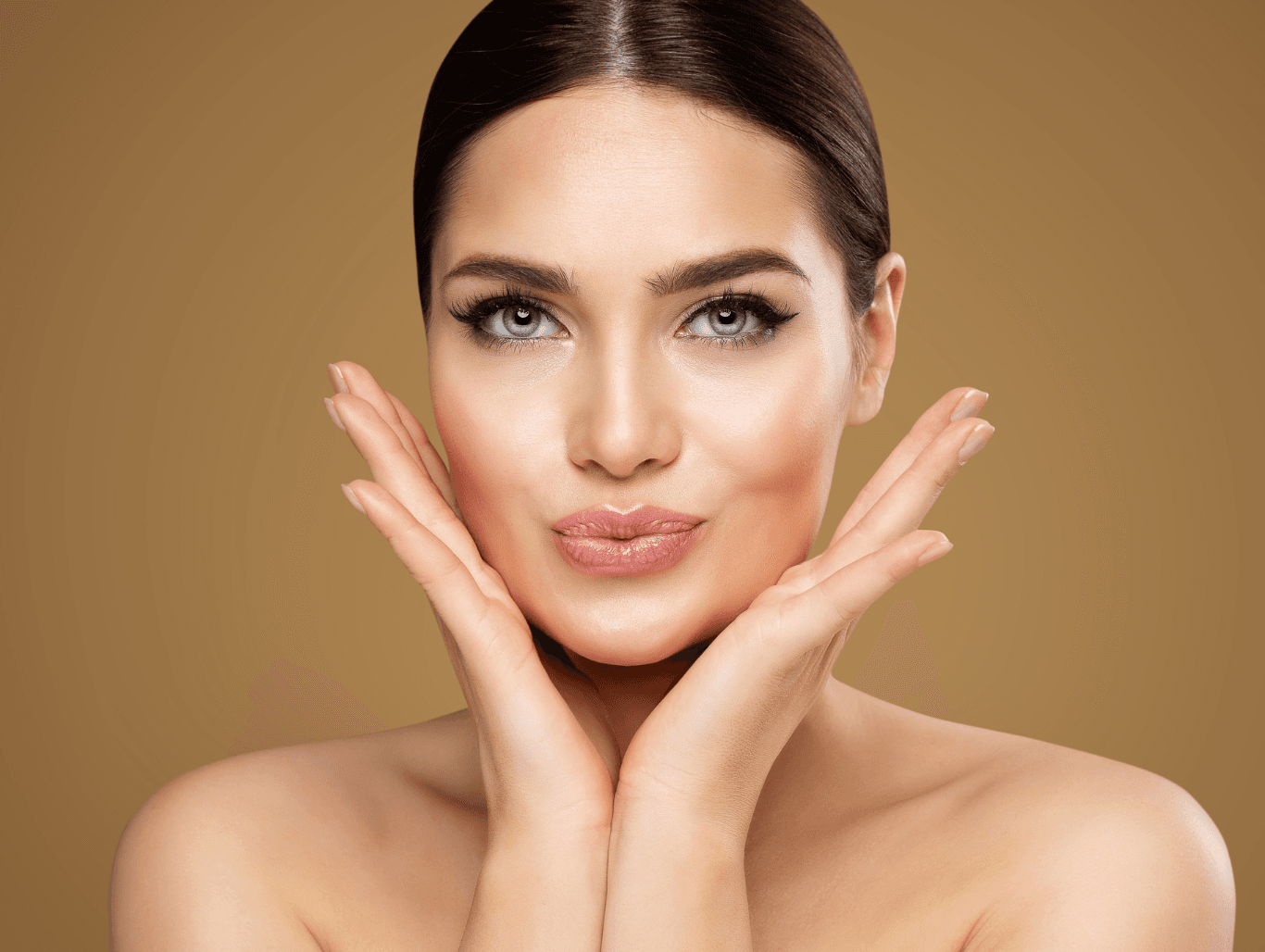 Beautiful woman with smooth skin and defined brows after eyebrow, lip and chin waxing at a professional Weymouth beauty salon