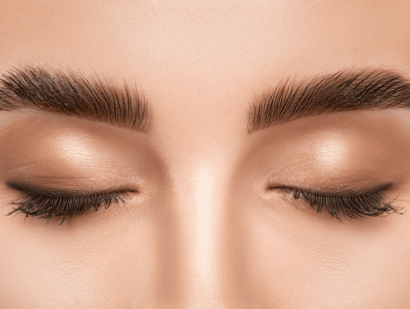 Close-up of freshly tinted eyelashes and eyebrows showing enhanced shape and colour after lash and brow tint treatment in Weymouth