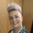 Nicki Cattel, salon owner of Changing Grooms in Weymouth, smiling with a stylish short silver hairstyle
