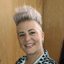 Nicki Cattel, salon owner of Changing Grooms in Weymouth, smiling with a stylish short silver hairstyle